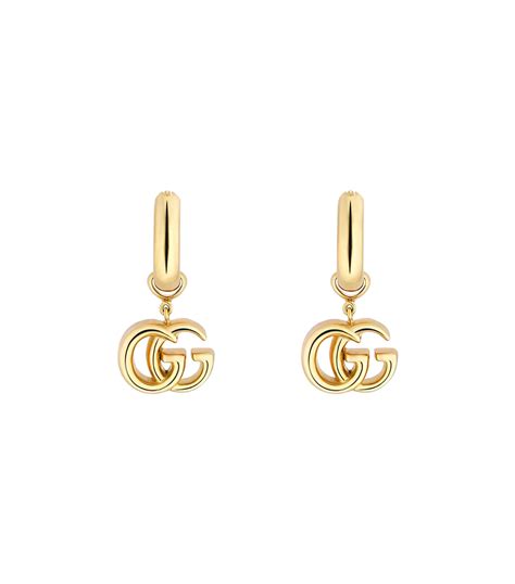aretes gucci oro